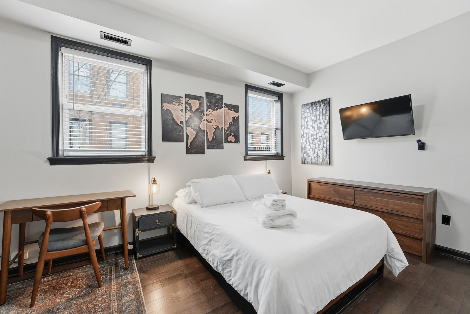 Queen bedroom with dedicated workspace
