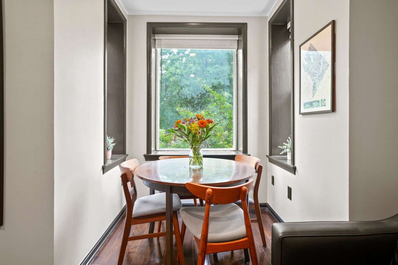 Bay-window breakfast nook with garden views