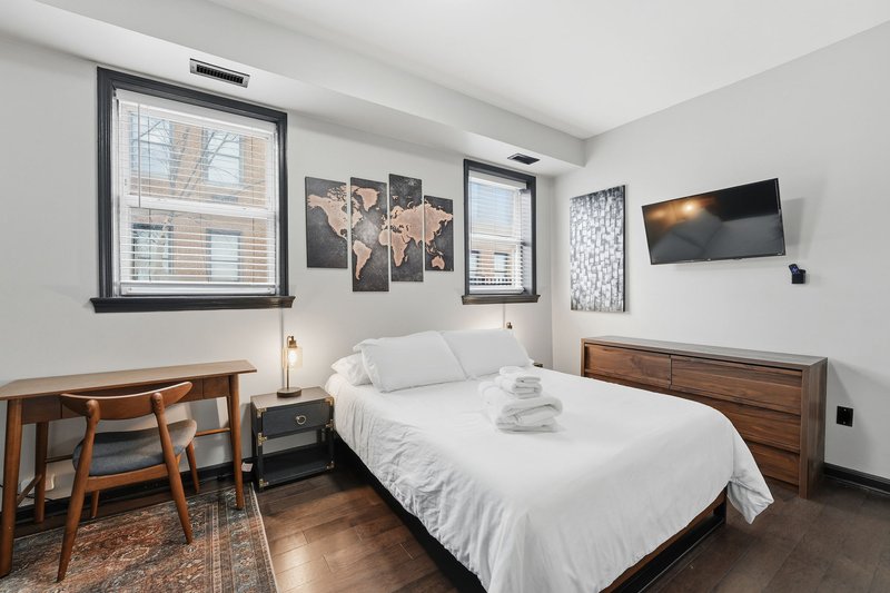 Queen bedroom with dedicated workspace
